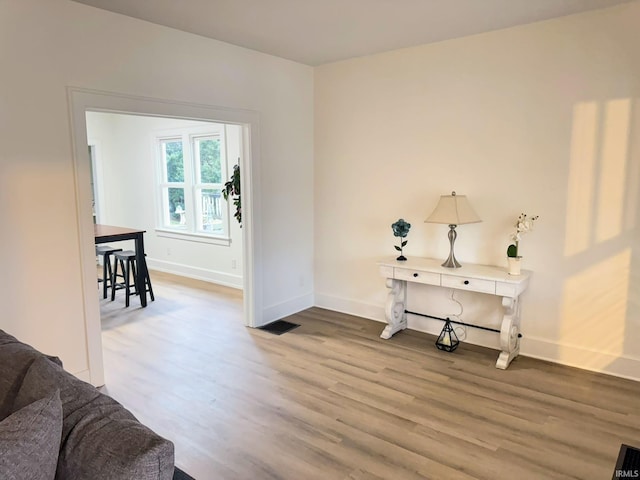 interior space with hardwood / wood-style flooring