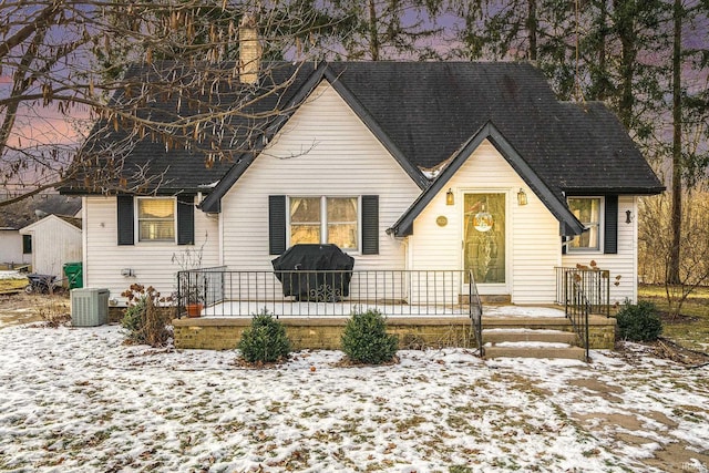 view of front of home featuring cooling unit