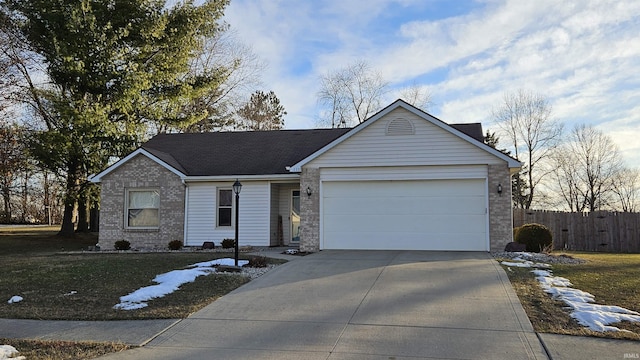 single story home featuring a garage