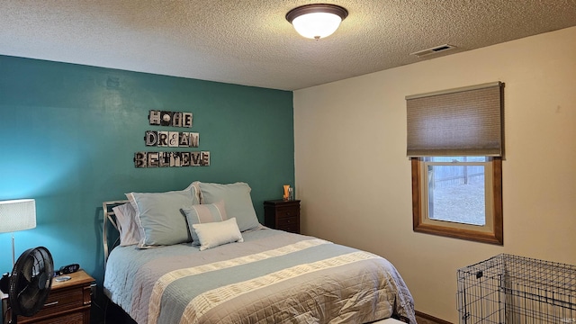 bedroom with a textured ceiling