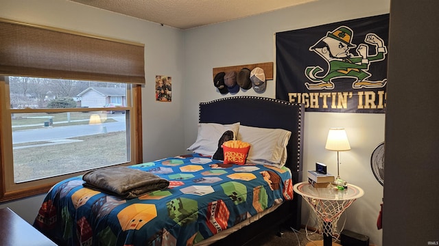 bedroom featuring a textured ceiling