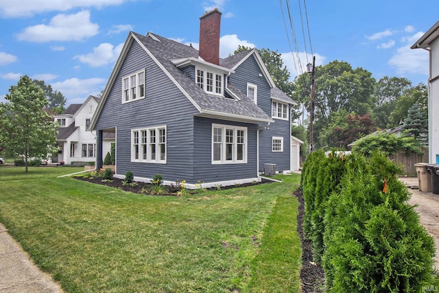 view of home's exterior featuring a yard