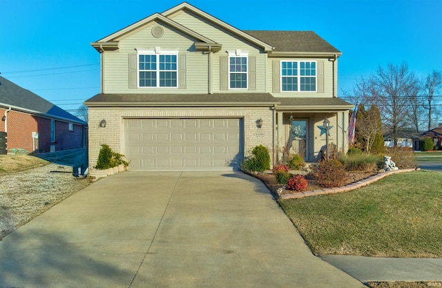 view of front of home featuring a garage and a front lawn