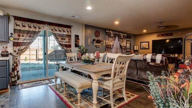 dining area featuring dark hardwood / wood-style floors