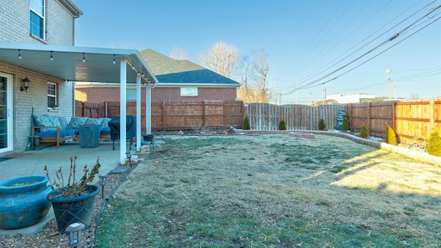 view of yard with a patio area