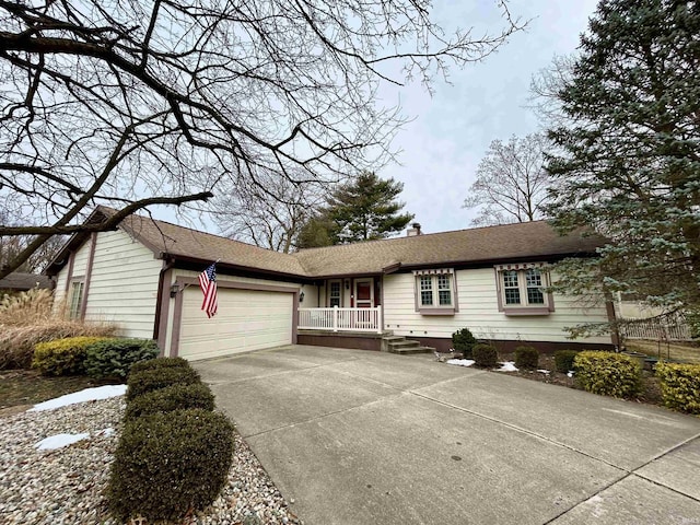 ranch-style house featuring a garage