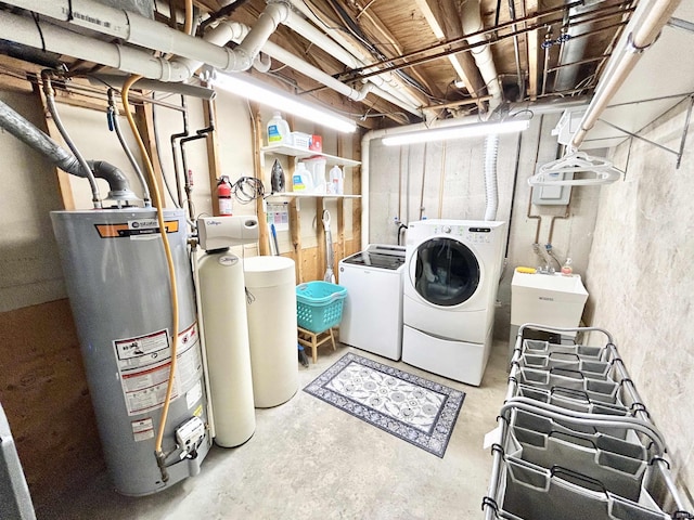 washroom with independent washer and dryer and water heater