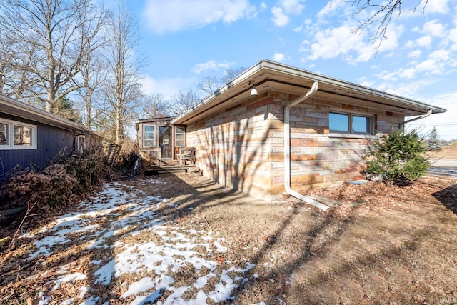 view of snow covered property