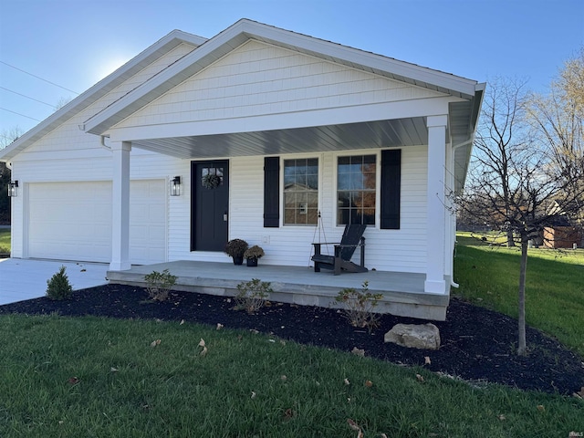 view of front of home with a garage, covered porch, and a front lawn