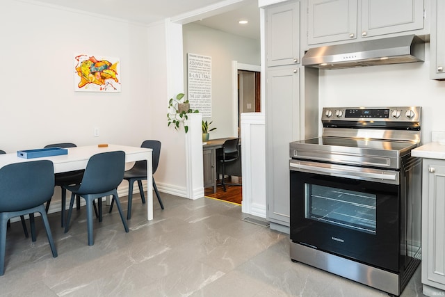 kitchen featuring electric range