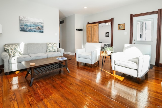 living room with hardwood / wood-style flooring