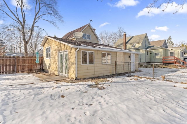 view of snow covered property