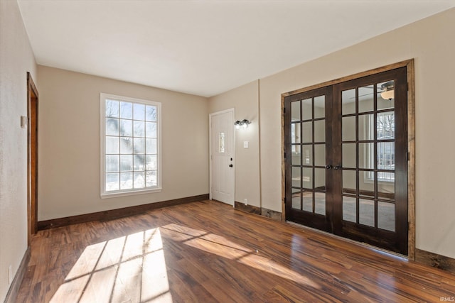 interior space featuring dark hardwood / wood-style flooring and french doors