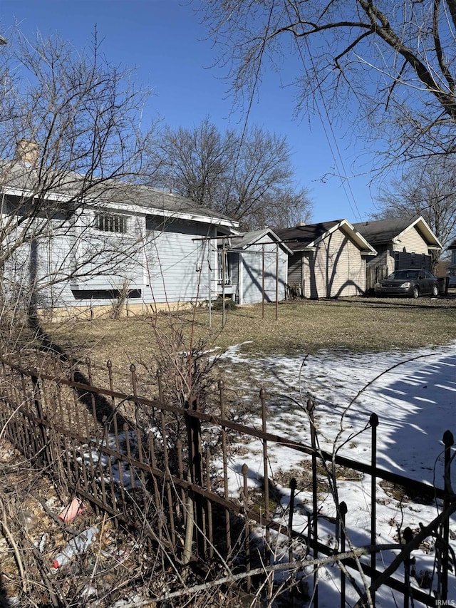 view of snow covered property