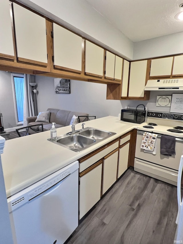 kitchen featuring dark wood-type flooring, sink, white cabinetry, dishwasher, and white range with electric stovetop