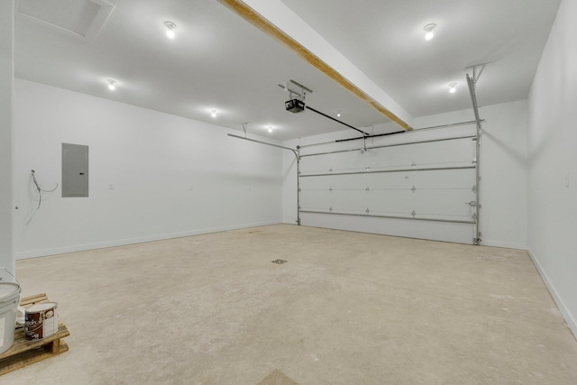 garage with a garage door opener and electric panel