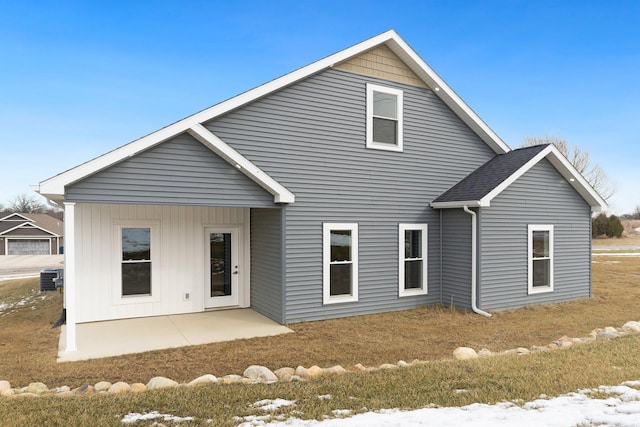 rear view of house featuring a patio