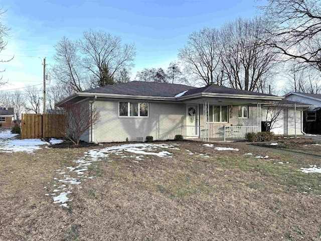 ranch-style house featuring a porch