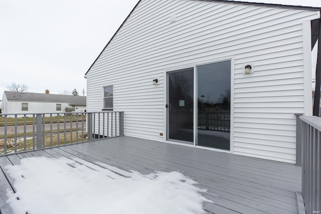 view of snow covered deck