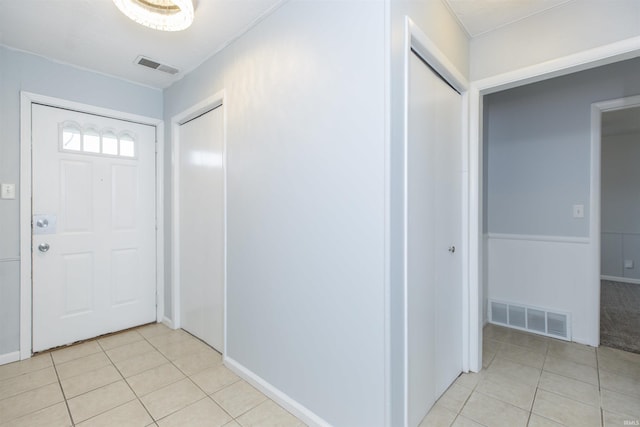 view of tiled foyer entrance