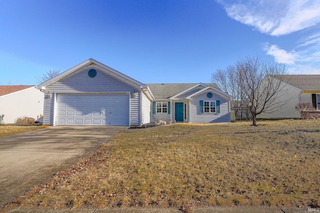 ranch-style home with a garage and a front lawn