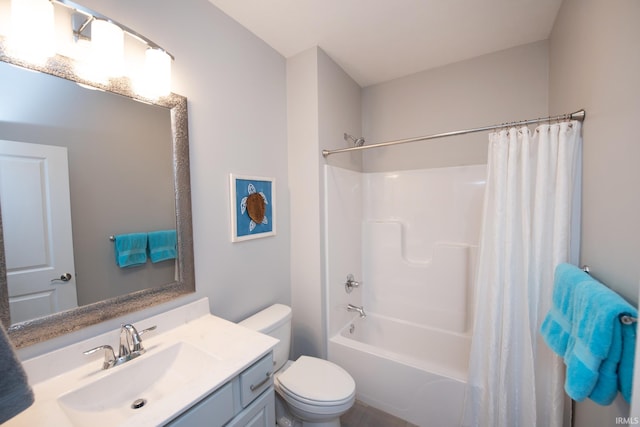 full bathroom featuring vanity, shower / bath combination with curtain, and toilet