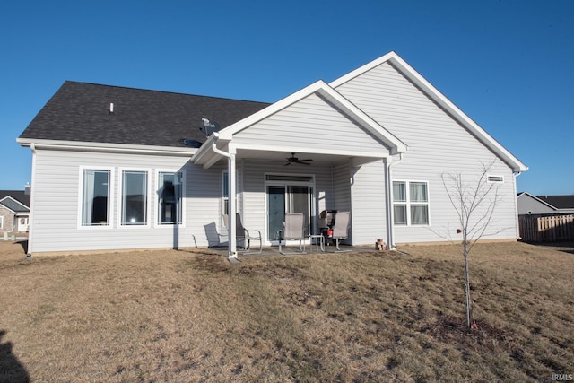 back of property featuring a patio area, ceiling fan, and a lawn