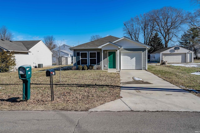 ranch-style home with a garage, an outbuilding, and a front lawn