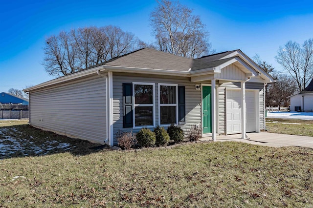 single story home with a garage and a front yard