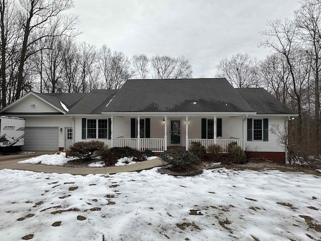 view of front facade featuring a garage and covered porch