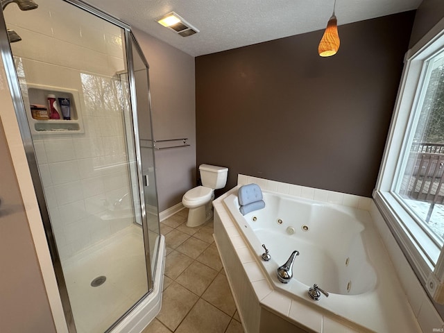 bathroom featuring tile patterned floors, toilet, a textured ceiling, and plus walk in shower