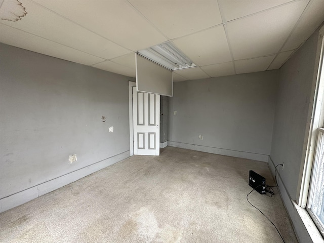 spare room with a paneled ceiling