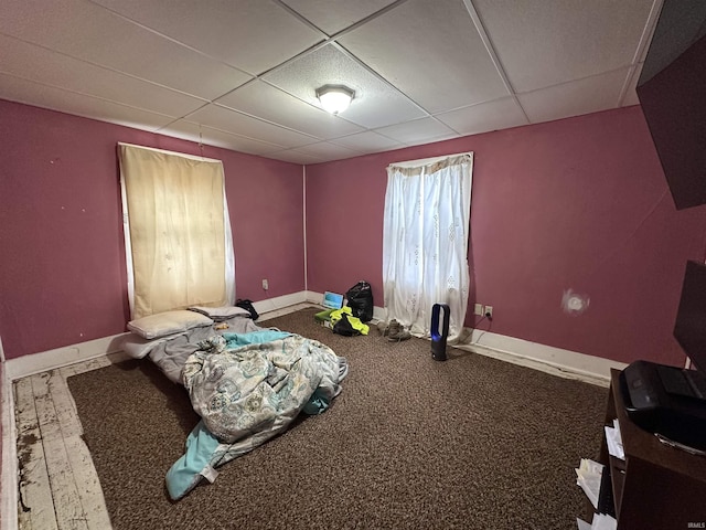 bedroom featuring a drop ceiling