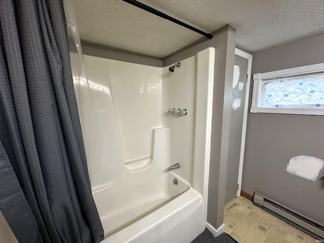 bathroom featuring shower / bath combination with curtain, a textured ceiling, and baseboard heating