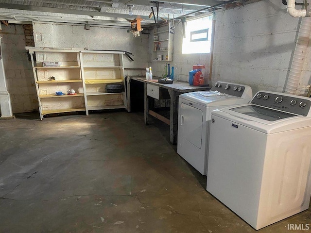 washroom with washing machine and dryer