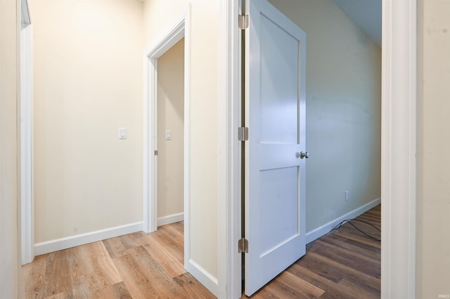 corridor featuring light hardwood / wood-style flooring