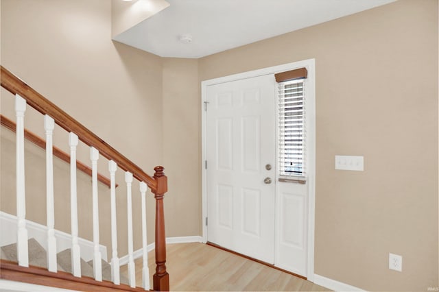 foyer with light wood-type flooring