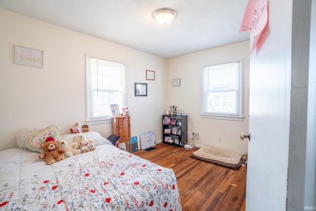 bedroom featuring wood-type flooring