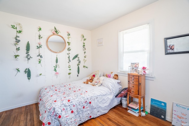 bedroom featuring dark wood-type flooring