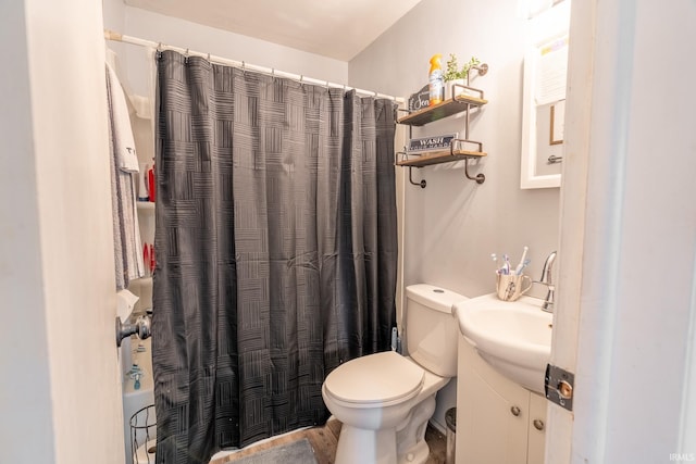 bathroom with vanity, a shower with curtain, and toilet