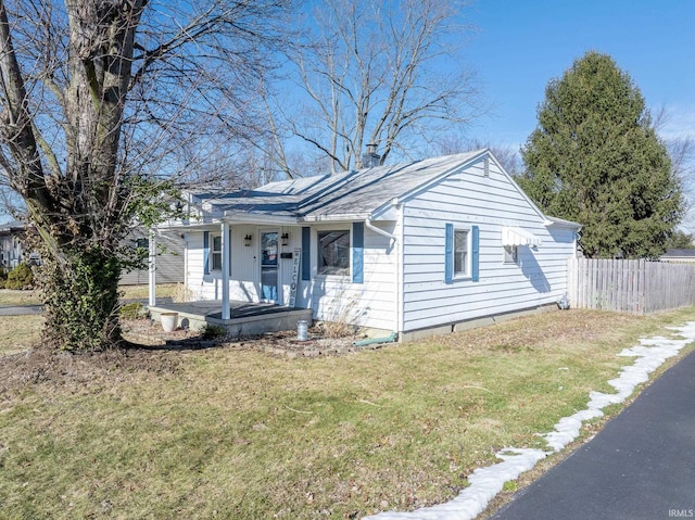 view of front of house with a front lawn and a porch