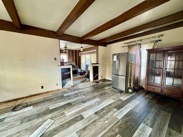 interior space with beamed ceiling and wood-type flooring