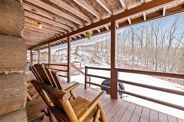 view of snow covered deck