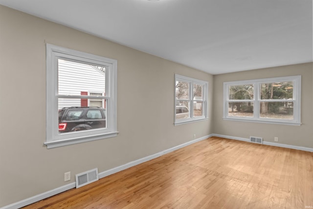 empty room featuring light hardwood / wood-style floors