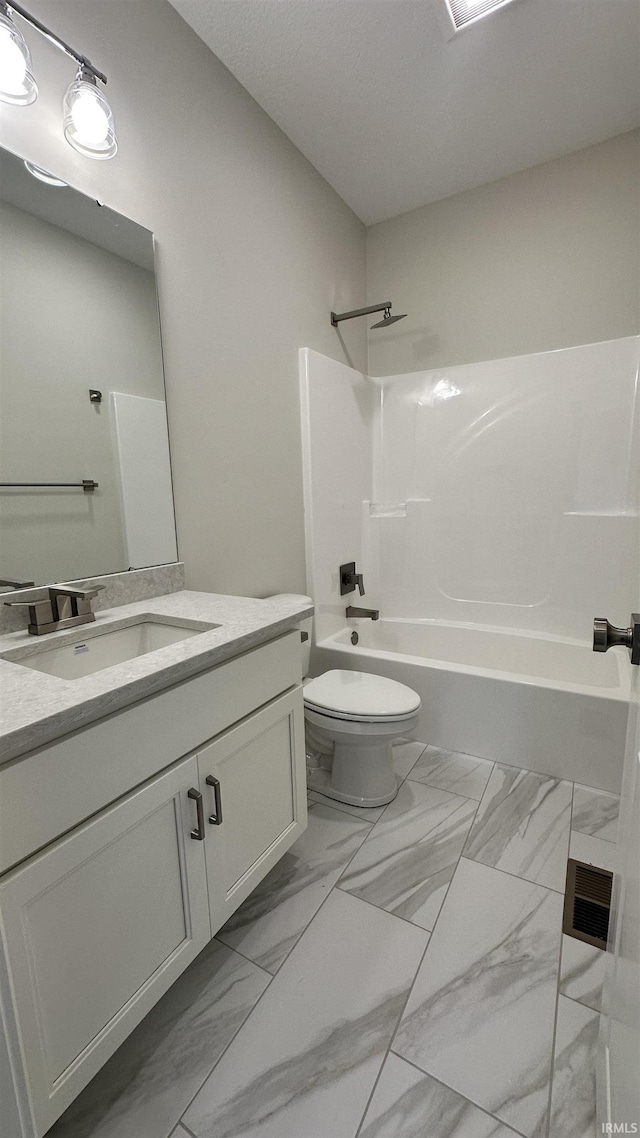 full bath featuring visible vents, toilet, shower / bath combination, marble finish floor, and vanity