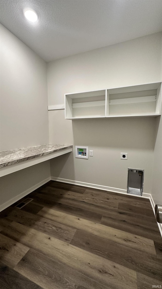 laundry area with baseboards, washer hookup, laundry area, hookup for an electric dryer, and dark wood-style flooring