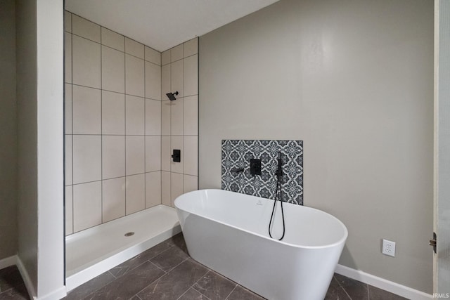 bathroom with a tile shower