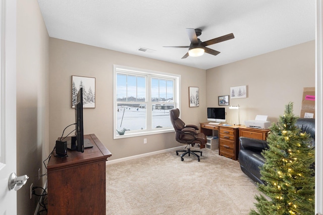 office featuring ceiling fan and light colored carpet