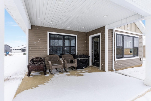 view of snow covered patio