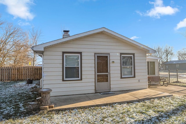 rear view of house featuring a patio area